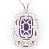 Purple Amethyst sterling silver pendant featuring intricate design and sparkling accents for elegant style.
